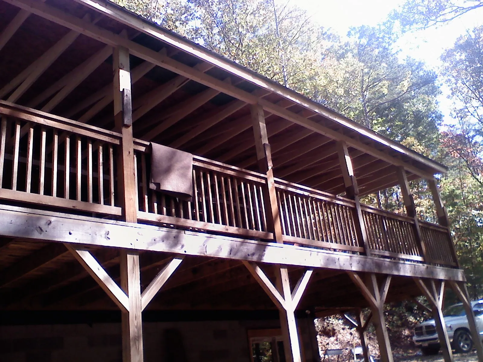 Timber framing under a new elevated porch and deck — Roof Leak Repair in Valley City by Roofing Brothers